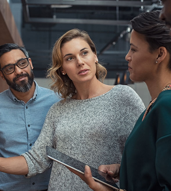 Multiethnic business people discussing charts and graphs